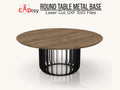 A sleek, industrial metal round table base, made from plasma dxf files, shown ready for a tabletop.