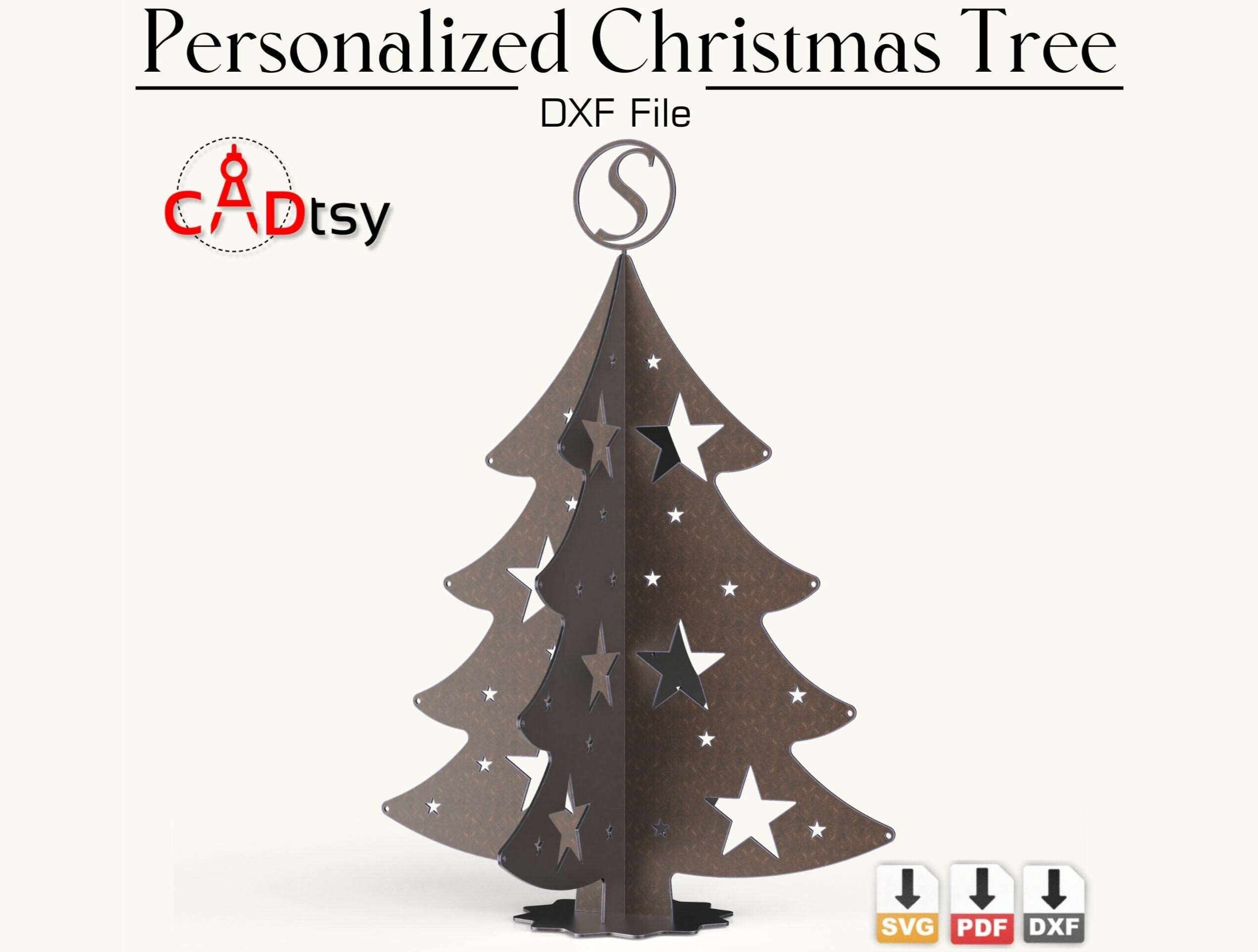 A personalized metal Christmas tree, made from an SVG file, shown with a name cut into it as festive holiday decor.