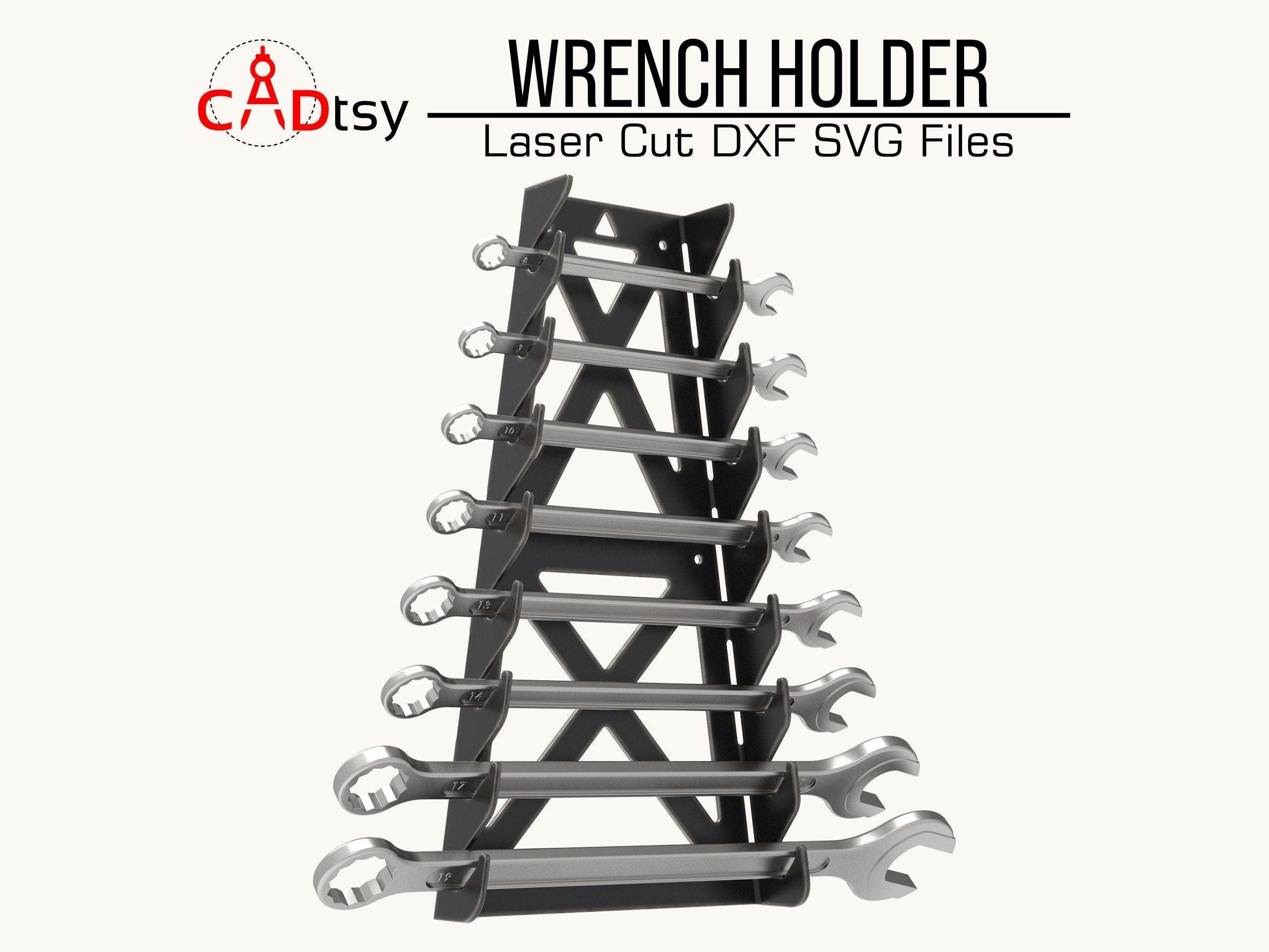 A black metal wrench holder, made from a DXF file, mounted on a wall and holding a set of combination wrenches.