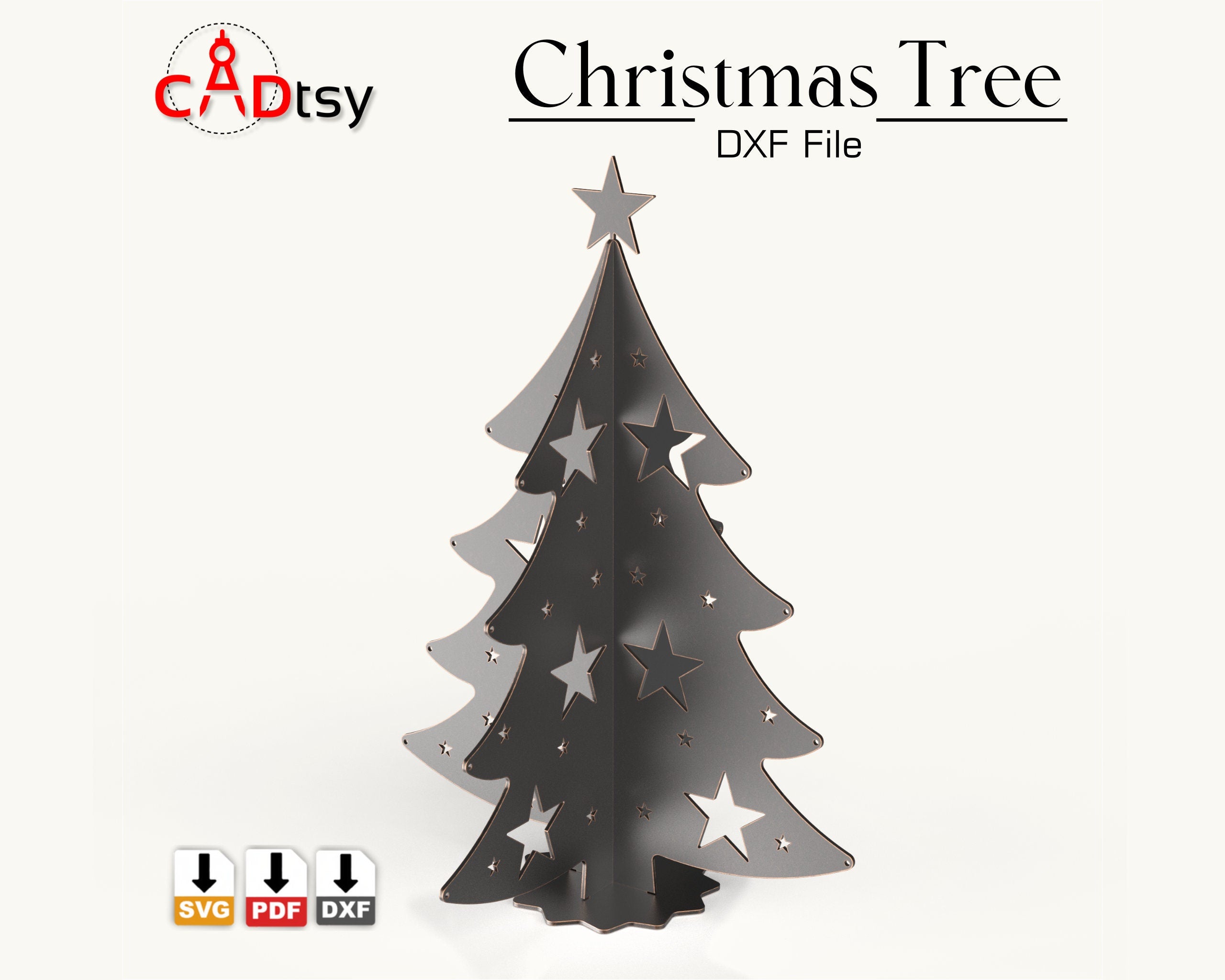 A 3D metal Christmas tree decoration, made from a DXF file, sitting on a table with festive lights in the background.
